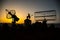 Space radar antenna on sunset. Silhouettes of satellite dishes or radio antennas against night sky. Space observatory or Air