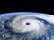 Space view of a gigantic hurricane, tornado, cyclone, swirling above the Earth