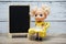 Space wooden easel blackboard with space copy on wooden background