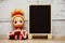 Space wooden easel blackboard with space copy on wooden background