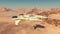 Spacecraft over a sand desert