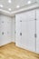 Spacious dressing room with classic style wardrobes