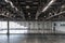 Spacious empty pavilion with windows for exhibitions and fairs. Hangar, a place intended for storage of large-sized