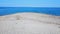 Spacious exotic sand beach with seagulls and beautiful blue sea. Aerial view