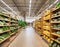 A Spacious Grocery Store with Fully Stocked Shelves in a Blurry Interior. Concept Supermarket