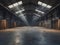 Spacious industrial warehouse with sunbeams shining through skylights onto the concrete floor.
