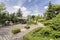 Spacious pebbled patio with plants