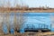 Spacious pedestrian pier made of wood on pontoons, easy boarding in boats or fishing