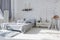 Spacious stylish modern trendy loft apartment in white and light colors. a large room full of sunlight. brick wall  wood floor
