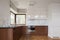 Spacious white and brown kitchen