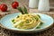 Spaghetti with asparagus pesto sauce and parmesan cheese