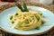 Spaghetti with asparagus pesto sauce and parmesan cheese