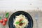 spaghetti on back dish with fresh tomatoes basil italian herbs o