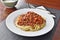 Spaghetti Bolognese on a white plate