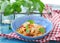 Spaghetti with calamary tomatoes and basil