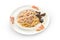 Spaghetti with carbonara in a creamy sauce sprinkled with parmesan. White plate with tasty and aromatic pasta on a white
