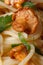 Spaghetti with chanterelles and parsley macro vertical