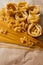 Spaghetti, farfalle and tagliatelle isolated on a white background.