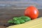 Spaghetti, fresh tomato and basil leaves