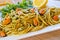 Spaghetti with mussels meat and pesto