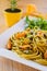 Spaghetti with mussels meat and pesto