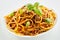 Spaghetti noodles with Bolognese sauce and basil