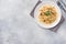 Spaghetti pasta Bolognese with vegetable sauce and cheese. Portion on a plate. Light concrete background. Copy space