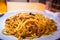 Spaghetti pasta with salmon sauce and seafood