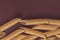 spaghetti and penne, feathers, set of italian pasta on a brown background