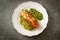 Spaghetti pesto with grilled salmon