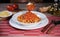 Spaghetti with pomodoro sauce basil with wooden background