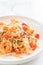 spaghetti with shrimps, tomatoes, basil and cheese