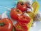 spaghetti, tomato, garlic plate on a blue wooden background