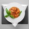 Spaghetti tuna pasta basil plate triangle shape slate table pretty