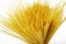 Spaghetti, yellow pasta background