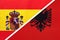 Spain and Albania, symbol of two national flags from textile. Championship between two european countries