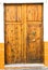 Spain. Ancient knocker on old wood door.