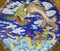 SPAIN, AVILA, 2016: The chinese plate with the dragon and bird Fenix in collections of church of Real monasterio de Santo Tomas