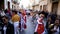 SPAIN, BARCELONA-13 APR 2019: Young people marching on holiday in modern costumes. Art. Spanish festive procession