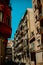 Spain, Barcelona, 14/07/2021. Beautiful balconies on the streets of Spain, small ordinary houses, a beautiful photo card