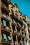 Spain, Barcelona, 14/07/2021. Beautiful balconies on the streets of Spain, small ordinary houses, a beautiful photo card