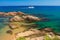 Spain, Costa Brava coastline. Mediterranean seascape with white yacht