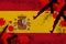 Spain flag and guns in red blood. Concept for terror attack and military operations