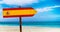 Spain flag on wooden table sign on beach background. It is summer sign of Spain