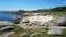 Spain Galicia coastline sandy beach with boulders