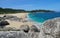 Spain Galicia coastline sandy beach with large rocks Atlantic ocean