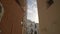 Spain, Ibiza Town daytime narrow street reveal