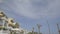 Spain, Ibiza Town streets beach and palm trees on sunny day