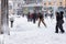 Spain, Madrid; January 9 2021: People skiing at the snow storm `Filomena` in the centre of Madrid, Street Mayor