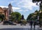 Spain; Oct 2020: People walking at La Rambla Nova, the main street of Tarragona. Modernist building Las Teresianas, famous statues